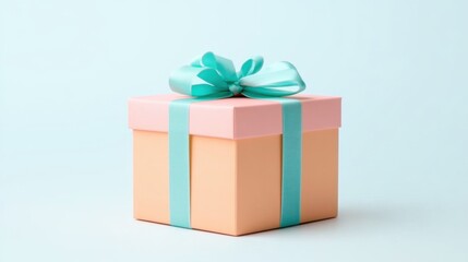 Obraz premium A pastel-colored gift box, adorned with a turquoise ribbon, is isolated against a light blue background. It exudes a sense of elegance and simplicity.