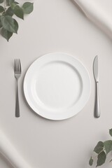 Elegant Empty Plate  Cutlery  Minimalist Table Setting  Greenery 