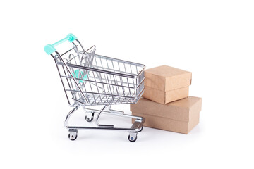 Shopping cart and shopping boxes. Shopping concept in a store.