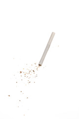 Close up white cigaratte and tobacco grains isolated on white background. Concept of harm of smoking. Free area for text