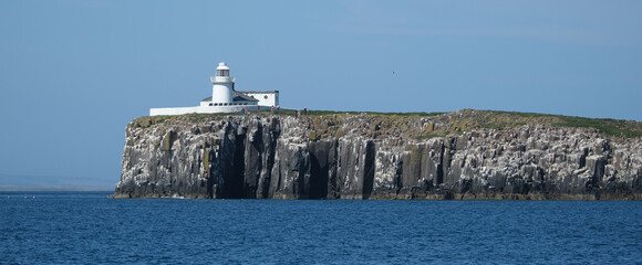 The Farne Islands are a group of islands off the coast of Northumberland, England.