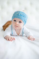 portrait of newborn baby boy dressed
