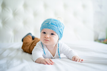 portrait of newborn baby boy dressed