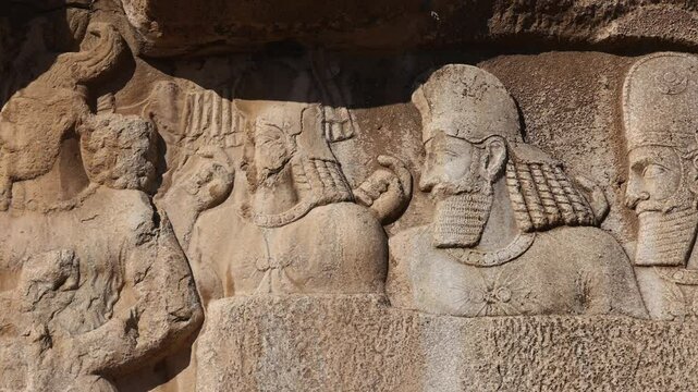 Naqsh-e Rostam necropolis of Persepolis in Fars Province with tomb of Darius I the Great, Iran. The tombs of the ancient Persian kings are decorated with bas-reliefs carved into the rocks