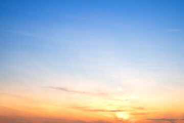Sky,sunset, beautiful , luxury soft gradient orange gold clouds and sunlight on the blue sky perfect for the background, Sunrise on morning or everning in winter warm time ,Twilight summer,silhouette
