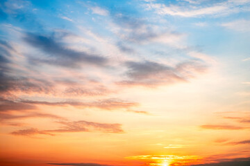 Sky,sunset, beautiful , luxury soft gradient orange gold clouds and sunlight on the blue sky perfect for the background, Sunrise on morning or everning in winter warm time ,Twilight summer,silhouette