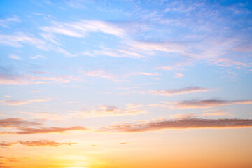 Sky,sunset, beautiful , luxury soft gradient orange gold clouds and sunlight on the blue sky perfect for the background, Sunrise on morning or everning in winter warm time ,Twilight summer,silhouette