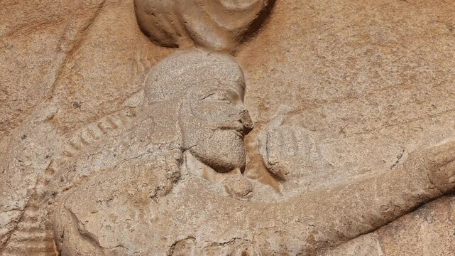 Naqsh-e Rostam necropolis of Persepolis in Fars Province with tomb of Darius I the Great, Iran. The tombs of the ancient Persian kings are decorated with bas-reliefs carved into the rocks