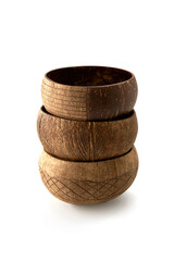 Handmade coconut bowls from recycled shells on a white background