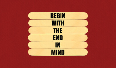 Begin in End of Mind Symbol. Concept word Begin With The End In Mind on beautiful wooden stick....
