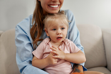 A Joyful Mother and Her Child Happily Enjoying and Sharing a Beautiful Moment Together