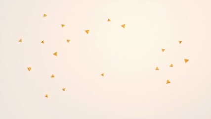 Fototapeta premium Abstract gold triangle confetti scattered on a pale background