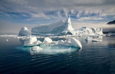 Iceberg in Kangerlussuaq Fjord in eastern Greenland. Large iceberg is floating in the ocean. © bonilook