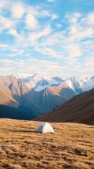 A peaceful view from a camping tent, showcasing majestic mountains under a sky with scattered clouds. The scene conveys a sense of tranquility and adventure.