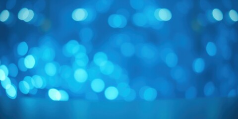 Abstract Blue Bokeh Background with Defocused Circular Lights and a Smooth Gradient