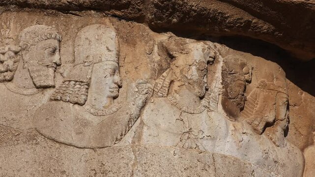 Naqsh-e Rostam necropolis of Persepolis in Fars Province with tomb of Darius I the Great, Iran. The tombs of the ancient Persian kings are decorated with bas-reliefs carved into the rocks