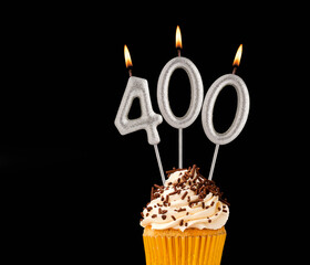 Candles forming the number 400 - Black background