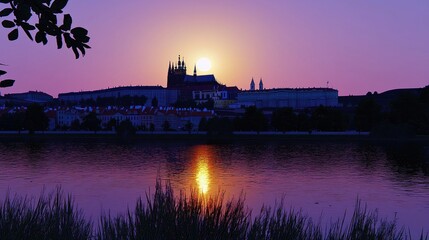 Fototapeta premium Sunset over castle, river, city; peaceful evening