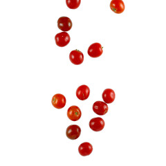 Vibrant cherry tomatoes falling and bouncing in slow motion