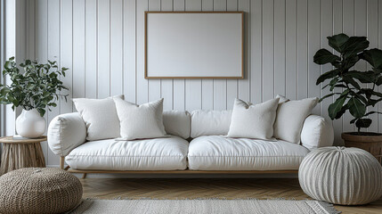 Serene Living Room: A minimalist living room design featuring a plush, off-white sofa, complemented by neutral-toned cushions and textured throws, sits against a backdrop of shiplap walls. A large.