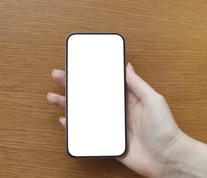 female hand holding modern smartphone with blank transparent background on wooden background