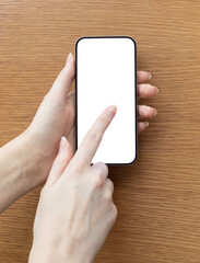 hand interacting with a smartphone, swiping or tapping on the blank white screen. Perfect for...