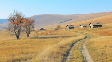 Obraz premium Autumnal hillside village road, rural houses, golden fields, clear sky, travel