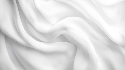 Obraz premium Close-up of elegant white fabric with soft folds and waves.