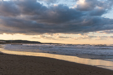 Stunning sunset view of Kumkoy beach. Black sea and amazing sky. Turkey, Kumköy