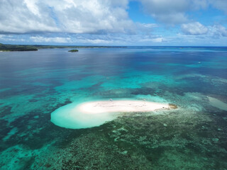 Aerial view ofnaked island in Siargao, Philippines, with a coral reef. High quality photo