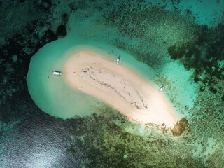 Aerial view ofnaked island in Siargao, Philippines, with a coral reef. High quality photo