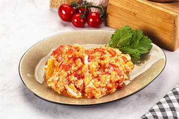 Shakshuka with tomato for breakfast