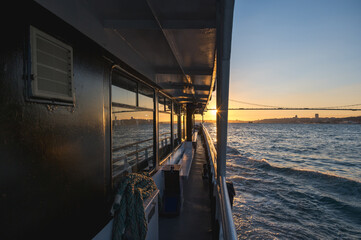 Amazing view of the Bosphorus from the deck of a ferry at sunset, Istanbul, Turkey.