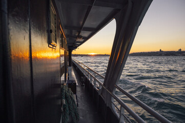 Amazing view of the Bosphorus from the deck of a ferry at sunset, Istanbul, Turkey.