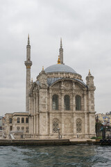 Naklejka premium View from the Bosphorus to 18th-century Ortakoy Mosque, formally the Büyük Mecidiye Camii in Beşiktaş, Istanbul, Turkey