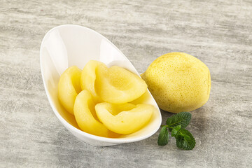 Canned yellow pear with syrup