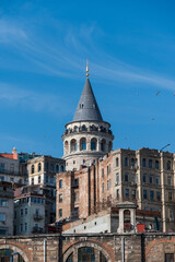 Fototapeta premium View of the Galata Tower from Eminonu district, Beyoglu district, Istanbul, Turkey. Bosphorus, Galata bridge, sunny day