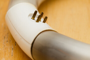 Circular fluorescent tube burned out and blackened at the cathodes, contact pad prongs oxidized