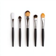 Set of artist brushes arranged on a white background with clear details and crisp appearance