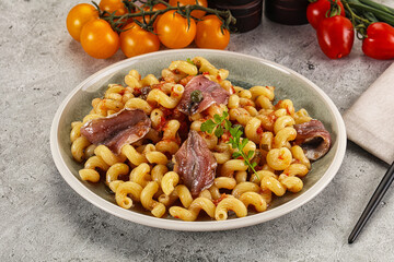 Italian pasta cellentani with anchovy