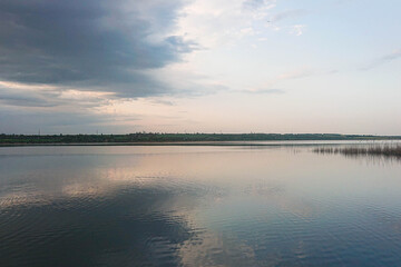 landscape with pond, sky and water