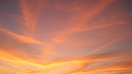 Fototapeta premium Serene Sunset Sky Warm Hues and Wispy Clouds