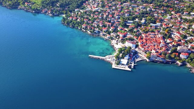 Seaside aerial view of old town Lovran in the northeast of the Istrian peninsula. Opatijska rivjera. Kvarner bay. Travel in Croatia