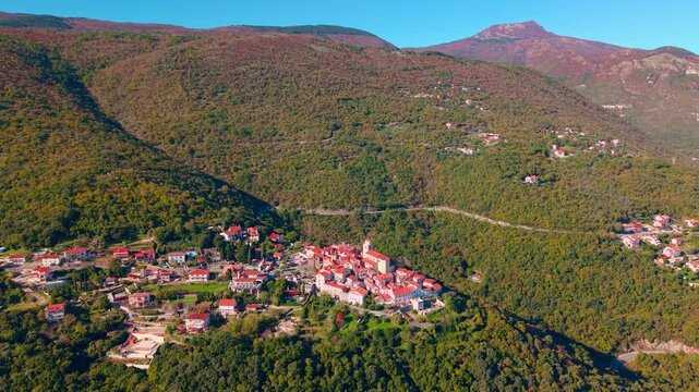 Moscenice - ancient Fortified medieval town on mountain slope in Croatia on Istria Peninsula. Mountain landscape, Adriatic coast