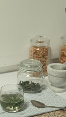 Dried moringa leaves or Moringa oleifera in hot water to create traditional herbal infusion, alternative medicine and wellness at home