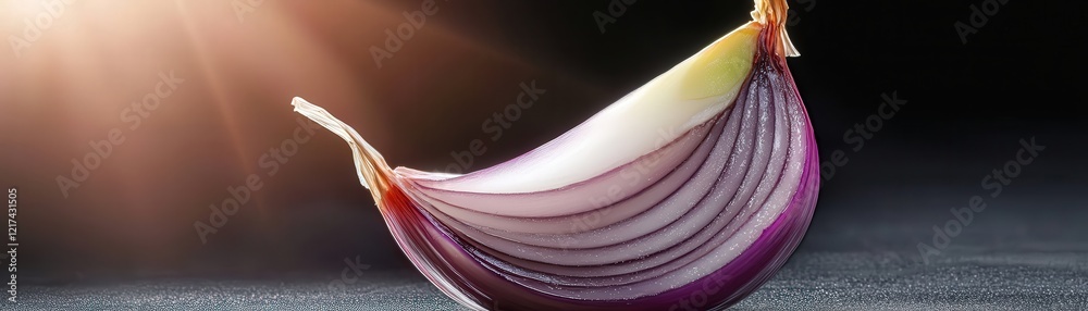 Poster a halved shallot with its layers glistening under soft lighting.
