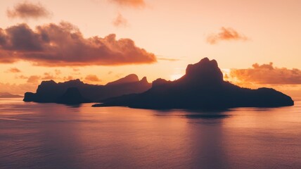 A serene sunset over silhouetted mountains, casting enchanting reflections on tranquil waters, highlighting the beauty of nature's palette.