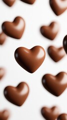 3d Milk chocolate heart pralines dropping valentine love, floating against pristine white backdrop, evoking sweet romantic mood. Vertical format Mocha Mousse