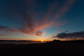 Early morning clouds at sunset time in spring in Pori, Finland