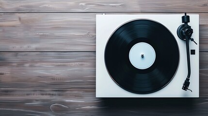 Obraz premium vintage turntable on wooden surface: nostalgic music experience